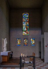 Blois, France - 10 27 2025: Detail view of a chapel and the stained glass window inside Basilica of...