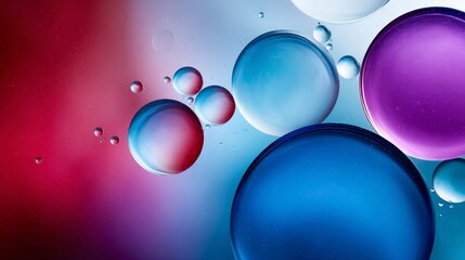 Elegant abstract composition of semitransparent colorful spheres floating in fluid motion over a luminous gradient background with ample copy space on the right side