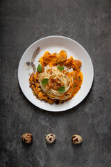 pasta with orange sauce and mint