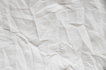 Obraz premium A close up view of a wrinkled white fabric creating an abstract design