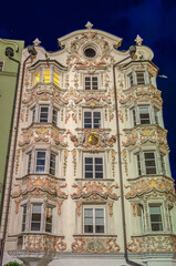 Fototapeta premium Night view of colorful facades in the old town of Innsbruck, Austria