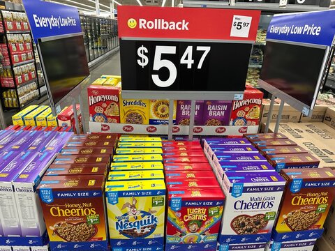 Retail cereal shelf display featuring General Mills brands under rollback pricing at Walmart. 11/09/2025, Strathmore, Alberta, Canada. Editorial Use Only.