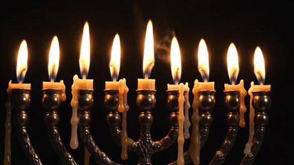 Lit Menorah Candles On Dark Background With Golden Yellow Flames And Dripping Wax - Powered by Adobe