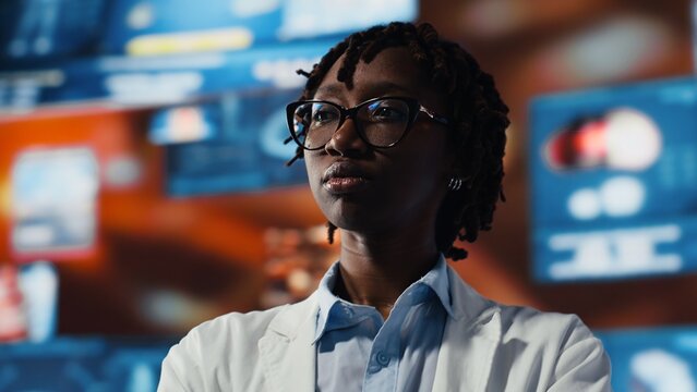Close up of doctor using videowall to look at holographic medical data charts. Biomedical specialist using diagnostic software on digital dashboard to analyze human organ scans diagrams