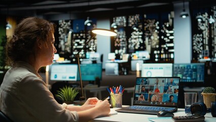 Executive manager interacting in a webinar video call for briefing, sharing latest report data...