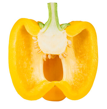 Yellow bell pepper cut in half showing seeds and interior isolated on transparent background