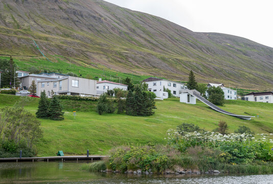 Town of Olafsfjordur in north Iceland on a summer day