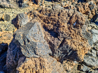 Volcanic rock textures forming natural geological surface