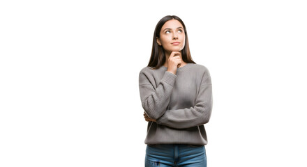Thoughtful young woman contemplating with hand on chin.