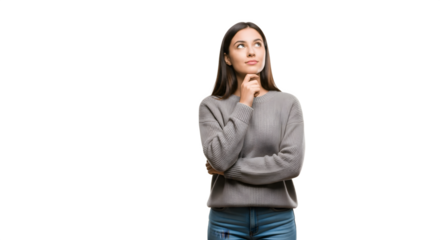 Thoughtful young woman contemplating with hand on chin.