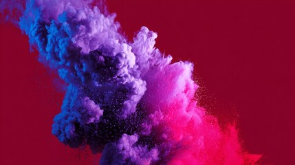 Fototapeta premium Vivid cloud of purple and red powder explosion