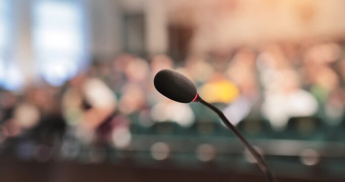View from the microphone in front of the audience, preparing to give a speech, a lecture, a sermon or start a class