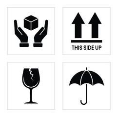 Collection of four shipping and handling symbols including handle with care, this side up, fragile glass, and keep dry