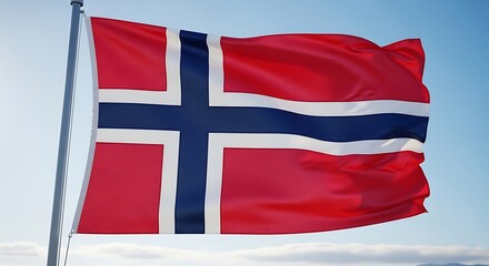 A norwegian flag waving gently against a clear blue sky on a metal pole in the bright sunlight