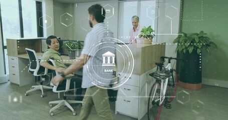 Walking Asian man wearing shirt with crossbody bag in bank reception area, with hexagonal graphics
