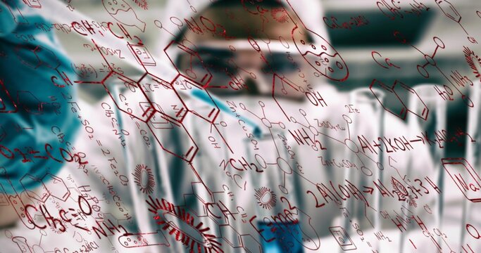 Writing chemist in lab coat drawing structures on glass board in lab, with red formulas