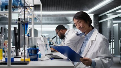 Senior laboratory scientist feeling neck ache while using computer to log patient data clinical. Lab professional pained by incorrect posture at PC, looking at genetic analysis documents, camera A - Powered by Adobe