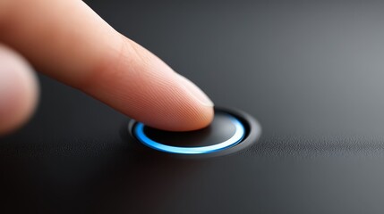 Close up of human finger delicately pressing illuminated button on sleek black surface initiating control digital interface interaction technology concept.