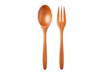 Shiny copper plated spoon and fork set isolated against a dark backdrop for elegant dining presentation