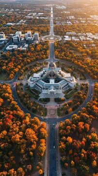 Drone View Parliament Building Canberra Autumn Orange Trees Golden Hour Sunlight