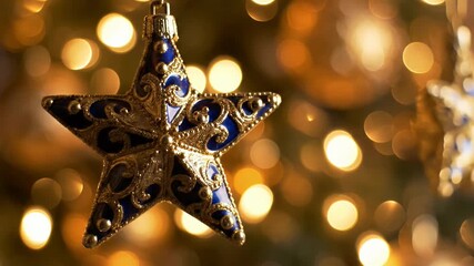 Close Up Shot of Ornate Blue and Gold Star Ornament Hanging with Defocused Christmas Lights in Background - Powered by Adobe