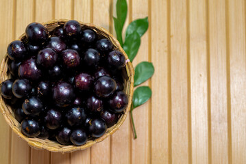 A bowl full of  fresh 'jabuticabas'