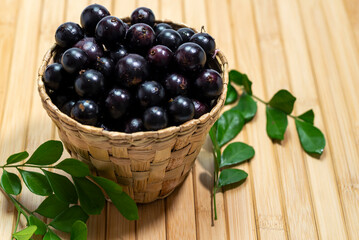 A bowl full of  fresh 'jabuticabas'