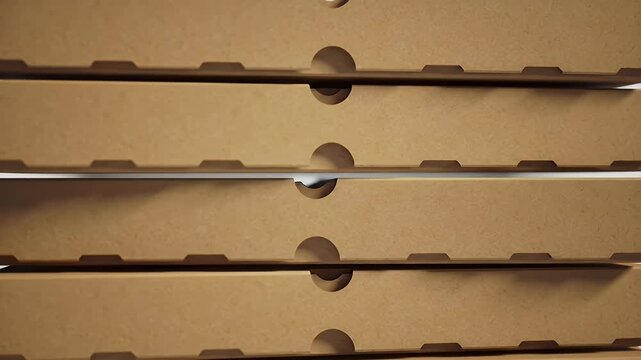 Stock footage of stacked pizza boxes in a food delivery service concept