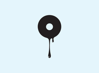 High-Contrast Doughnut Silhouette with Single Drip Isolated on White
