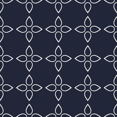 Fototapeta premium Seamless geometric pattern with floral motifs in navy blue and white