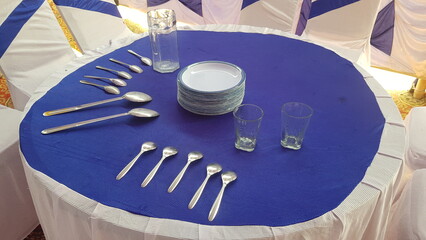 Dining Table Set with Blue Tablecloth for an Event
