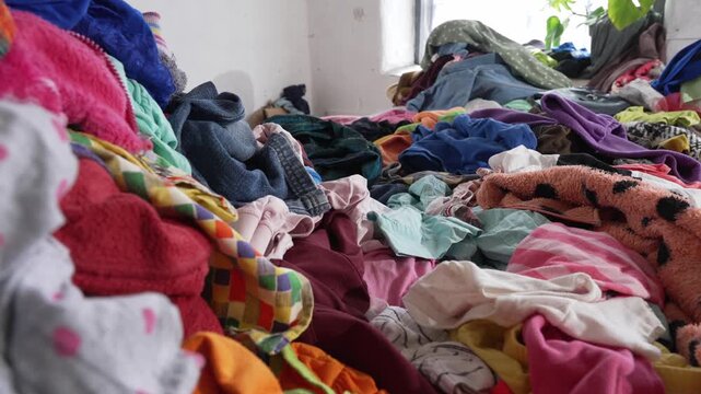 Old secondhand clothing. Textile and clothing industry waste