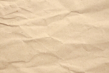 Abstract crumpled and creased recycle brown paper texture background