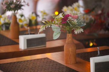 Beautiful table decor with flowers in a cozy dining space