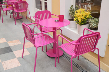 Bright pink cafe furniture adds vibrancy