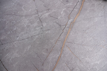 Detailed texture of a modern stone surface in gray