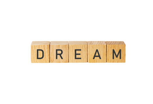 Wooden scrabble tiles spell out dream isolated on transparent background