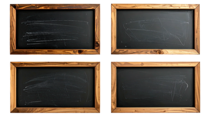 Four blank blackboards framed in wood, chalk marks visible