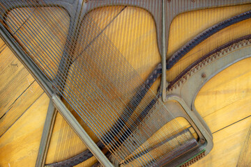 Abstract patterns, shapes and design inside an old piano image for background use