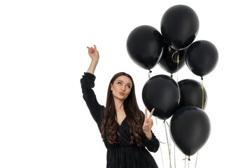 Woman celebrates Black Friday with black balloons, isolated, PNG