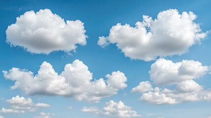 Obraz premium Fluffy white clouds float gently in bright blue sky, creating serene atmosphere