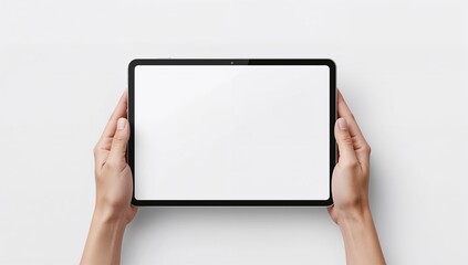 Hands holding a modern tablet device with a blank white screen