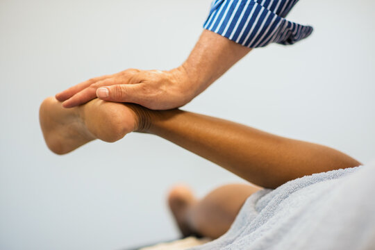 An osteopath manipulation in progress - horizontal - Powered by Adobe