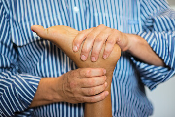 An osteopath manipulation in progress - horizontal