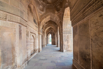 16th-century sandstone tomb of Sher Shah Suri in Sasaram, Bihar, set on a lake with a grand dome and intricate Indo-Islamic architecture reflecting history and royal elegance.
