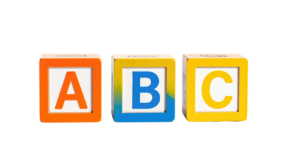 Three wooden alphabet blocks, each featuring a letter, lined up against a black background
