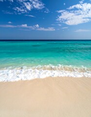 Fototapeta premium Picturesque coastal scene with clear turquoise water and a sandy shore