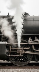 Vintage steam train with billowing smoke, capturing the power and nostalgia of a bygone era of rail transport