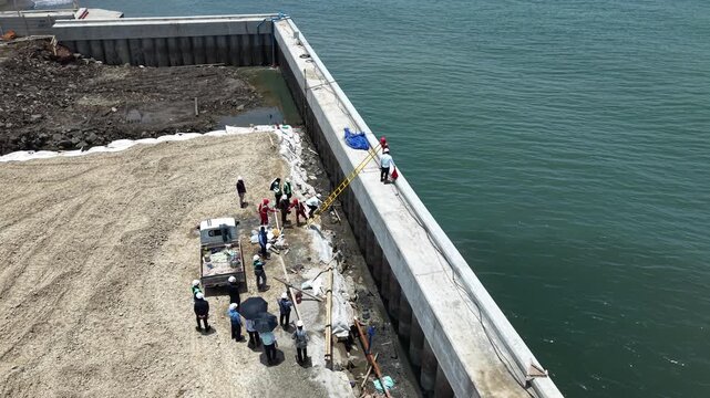 Construction Scene of the National Capital Integrated Coastal Development (NCICD) Project in jakarta, to Prevent Flooding Due to Land Subsidence