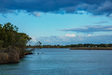  A serene coastal lagoon between Wollongong and Shellharbour, perfect for kayaking, fishing, birdwatching, and sunset walks &mdash; where nature, sky, and sea meet in harmony.